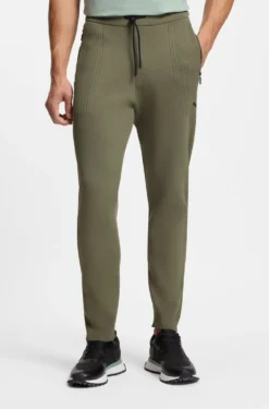 Active Regular-fit tracksuit bottoms with jacquard stripes