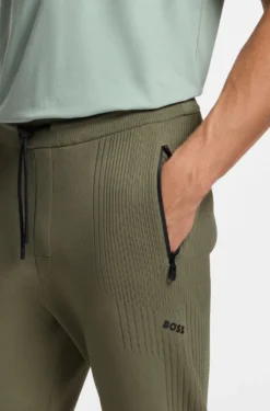 Active Regular-fit tracksuit bottoms with jacquard stripes