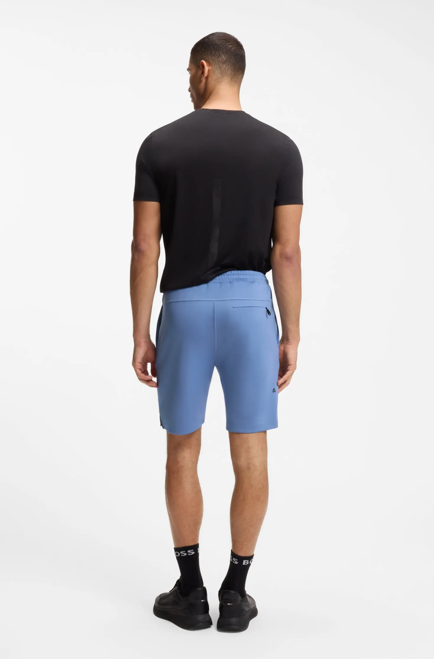 Active shorts in quick-dry fabric with reflective logo