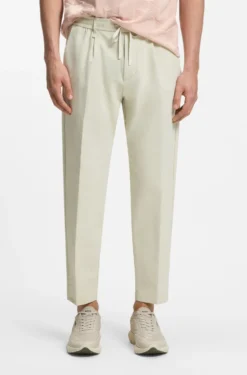 Active tapered-fit trousers in water-repellent stretch fabric