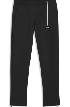 Active tracksuit bottoms in thermoregulating stretch gabardine