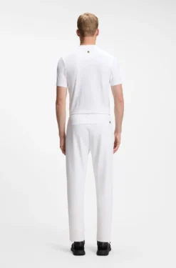 Active tracksuit bottoms in thermoregulating stretch gabardine