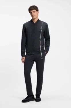 Active tracksuit bottoms in thermoregulating stretch gabardine