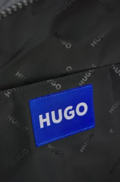 Backpack with blue rubber logo patch