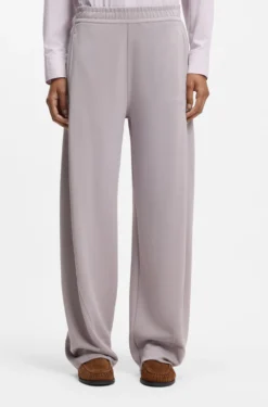 Balloon-fit tracksuit bottoms with logo embroidery