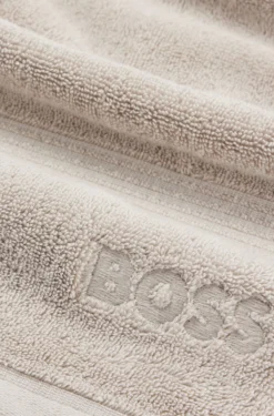 Beige Aegean-cotton bath sheet with tonal logo