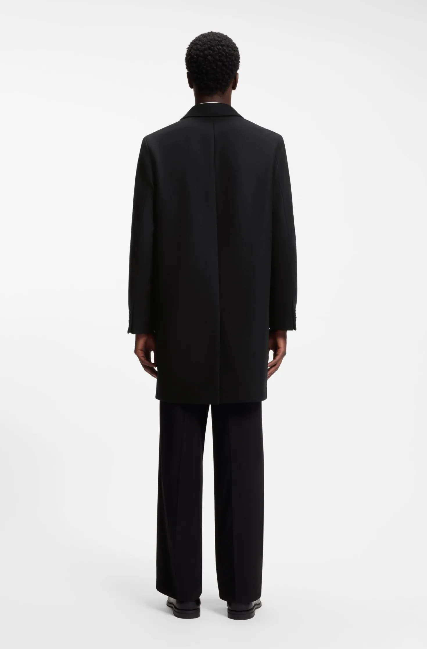 Buttoned coat in a virgin-wool blend