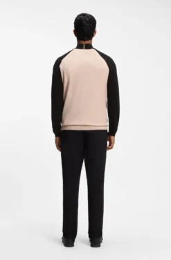 Colour-blocked sweater with zip neck