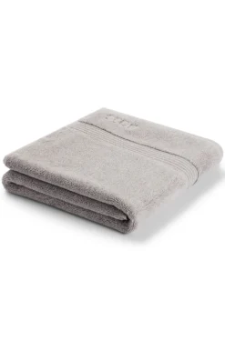 Cotton bath mat in silver with embroidered logo