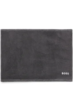 Cotton bath mat with contrast embroidered logo