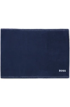 Cotton bath mat with contrast embroidered logo