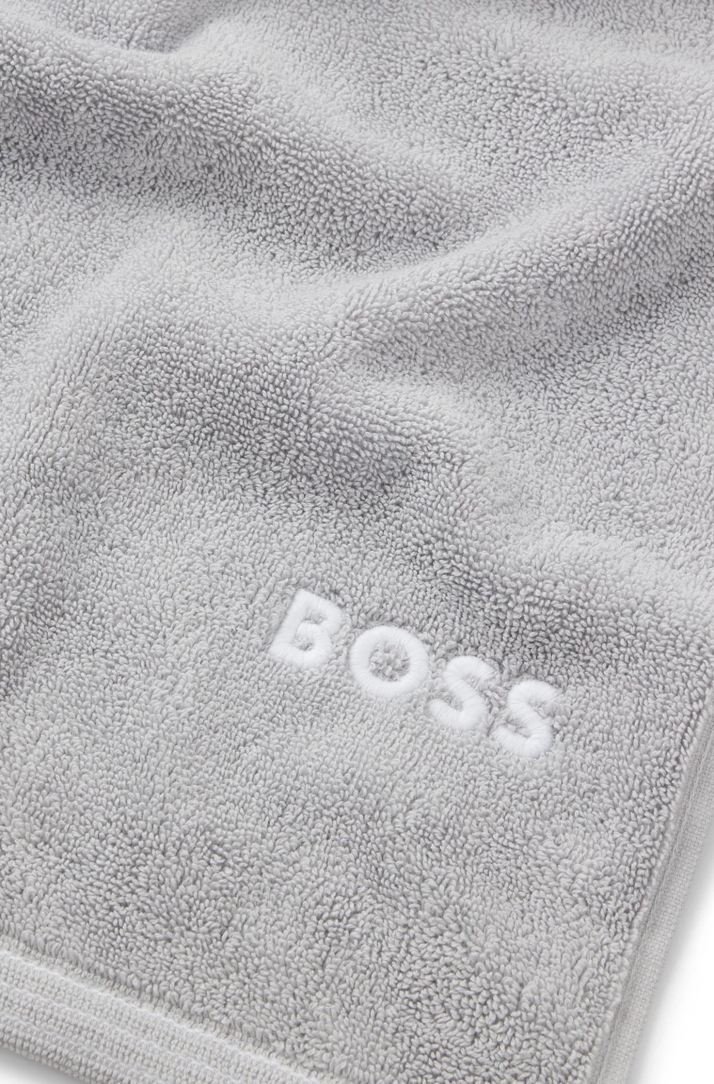 Cotton bath sheet with contrast embroidered logo