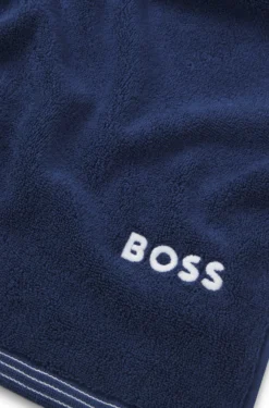 Cotton bath towel with contrast embroidered logo