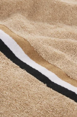Cotton bath towel with signature-stripe border