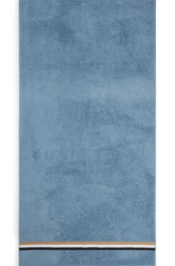 Cotton bath towel with signature-stripe border