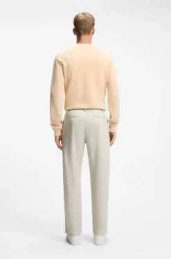 Cotton-blend chinos with pleat and patch pocket