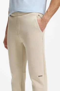 Cotton-blend tracksuit bottoms with reflective graphic