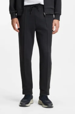 Cotton-blend tracksuit bottoms with piping details