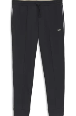 Cotton-blend tracksuit bottoms with piping details