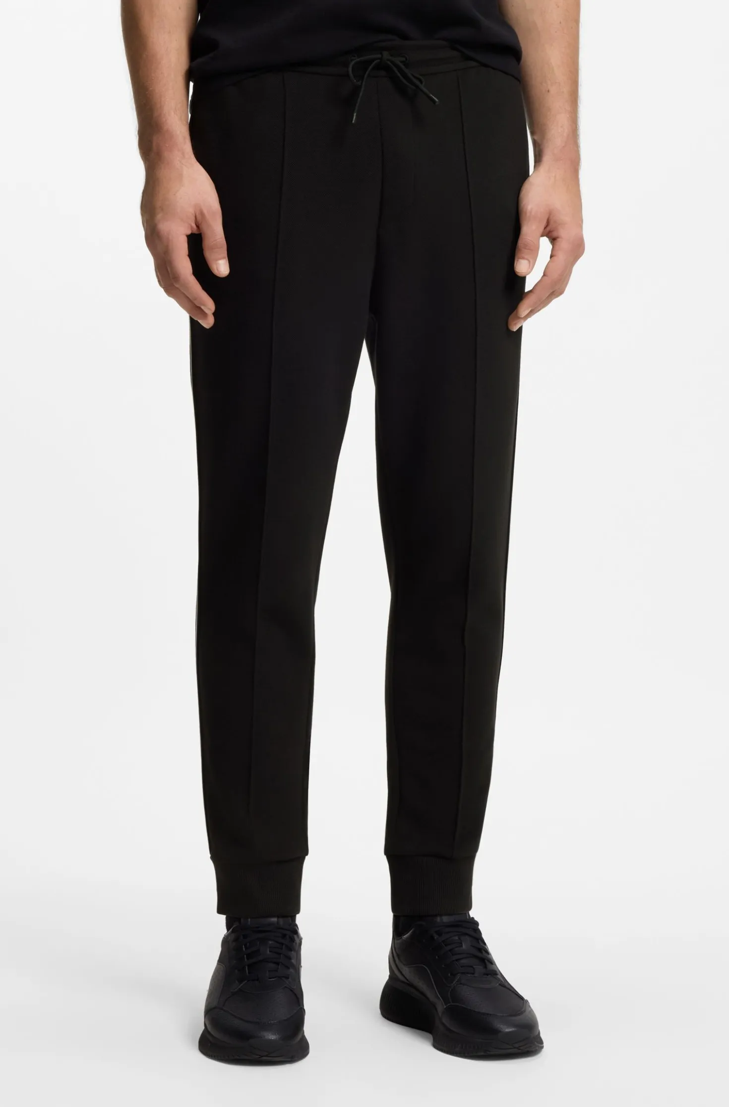 Cotton-blend tracksuit bottoms with piping details
