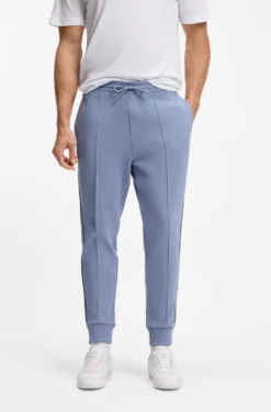 Cotton-blend tracksuit bottoms with piping details