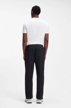 Cotton-blend tracksuit bottoms with tennis-themed logo