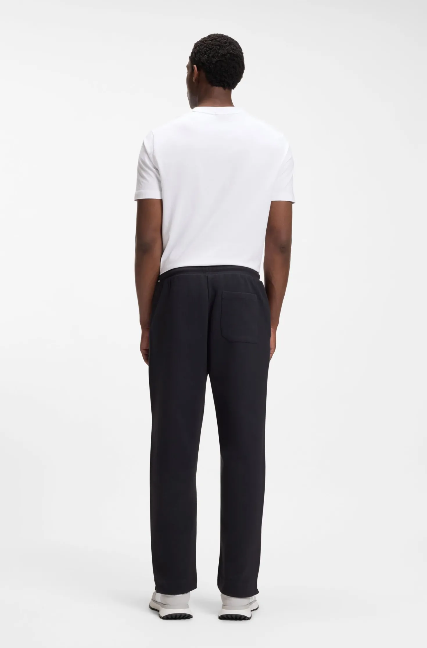 Cotton-blend tracksuit bottoms with tennis-themed logo