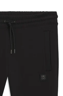 Cotton-blend tracksuit bottoms with stacked logo