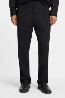 Cotton-blend tracksuit bottoms with drop-needle stripe