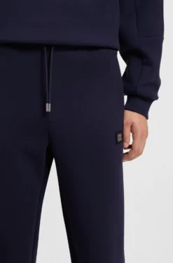 Cotton-blend tracksuit bottoms with stacked logo