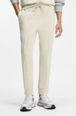 Cotton-blend tracksuit bottoms with piping details