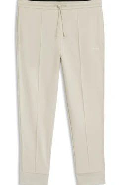 Cotton-blend tracksuit bottoms with piping details