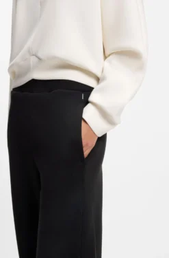 Cotton-blend tracksuit bottoms with lustrous piping