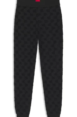 Cotton-blend tracksuit bottoms with all-over logo pattern