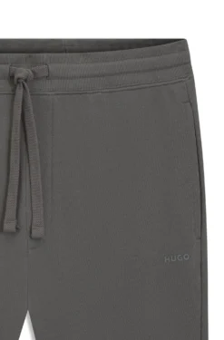 Cotton casual trousers with elasticated cuffs