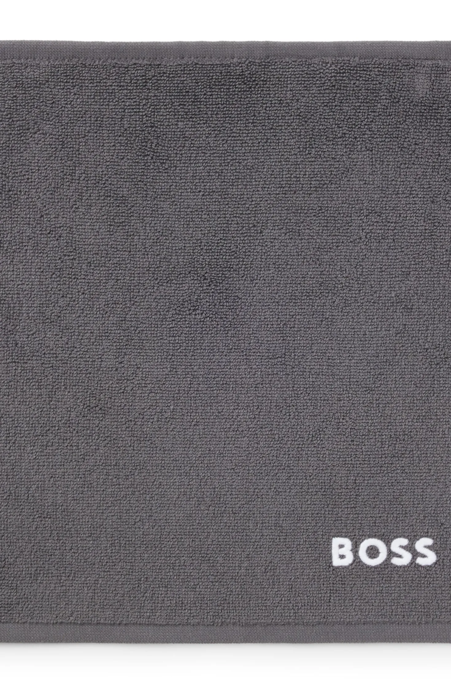 Cotton face cloth with contrast embroidered logo
