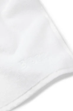 Cotton face cloth with contrast embroidered logo