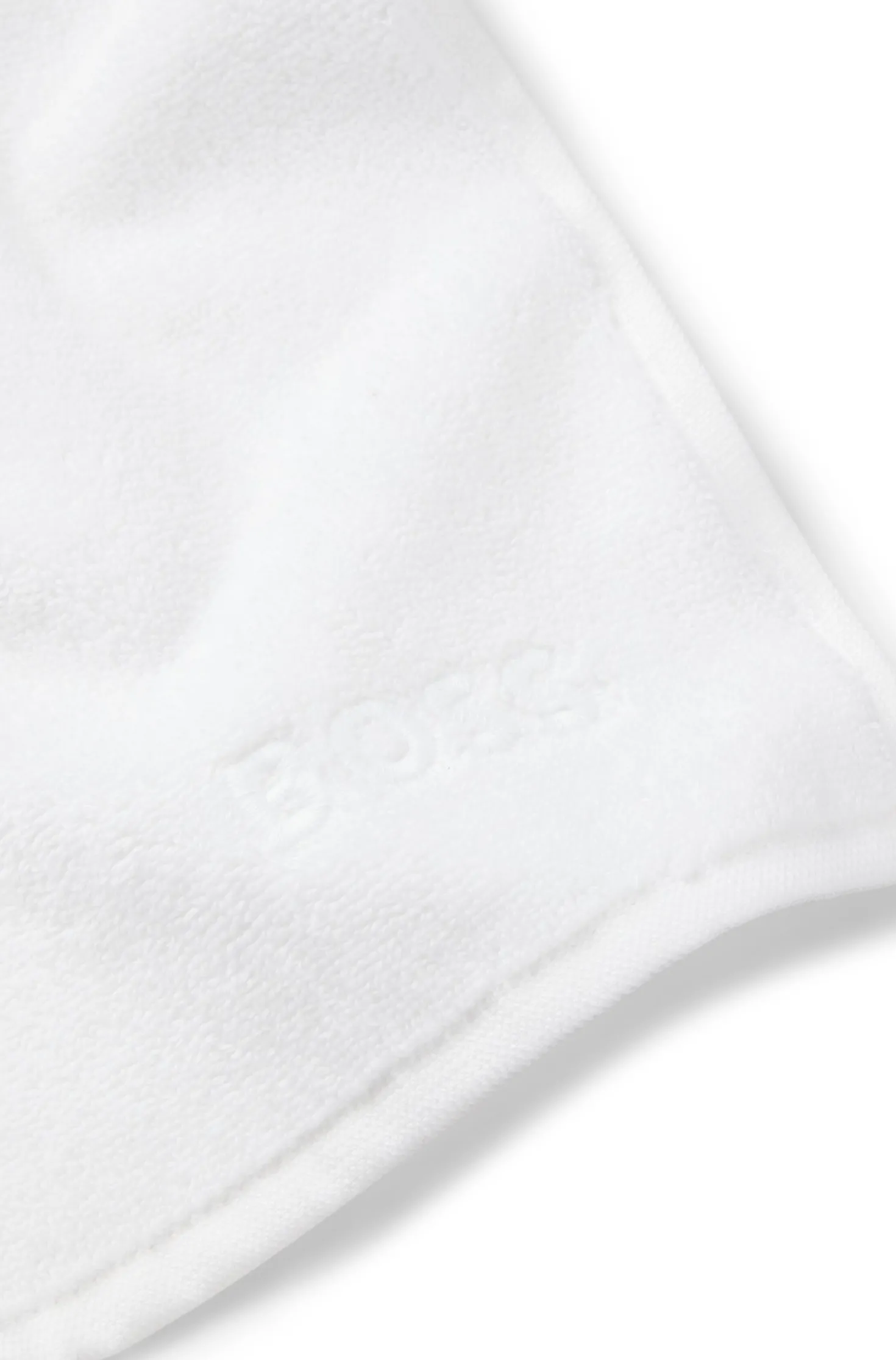 Cotton face cloth with contrast embroidered logo