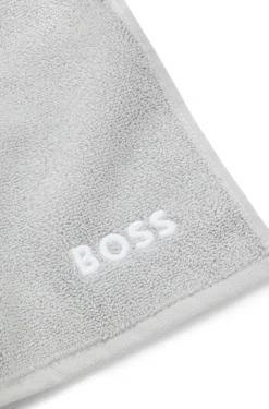 Cotton face cloth with contrast embroidered logo