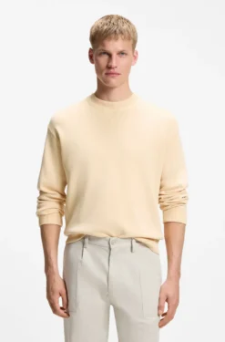 Cotton sweater with ribbed side seams