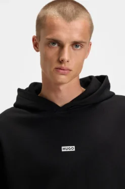 Cotton-terry loose-fit hoodie with logo details