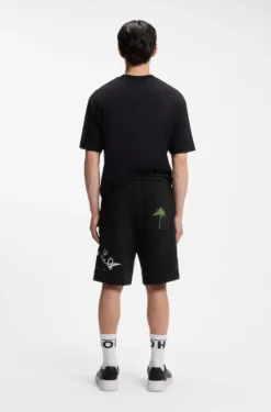Cotton-terry shorts with logo artwork