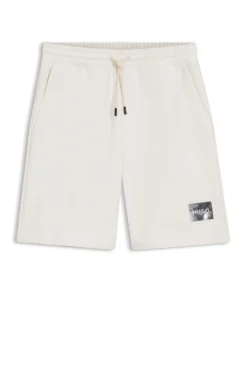 Cotton-terry shorts with tortoiseshell logo