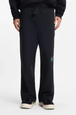 Cotton-terry tracksuit bottoms with logo print