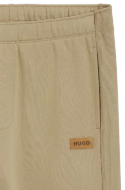 Cotton-terry tracksuit bottoms with logo badge