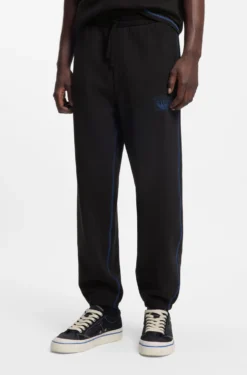 Cotton-terry tracksuit bottoms with logo and contrast stitching
