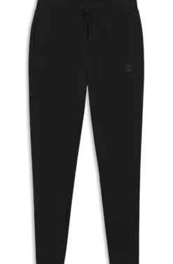 Cotton-terry tracksuit bottoms with logo patch