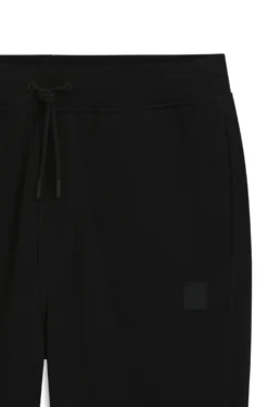 Cotton-terry tracksuit bottoms with logo patch