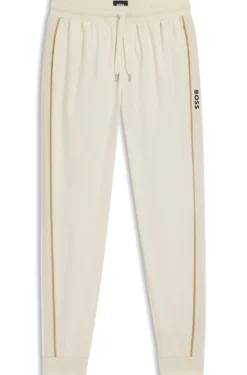 Cotton-terry tracksuit bottoms with tape and logo