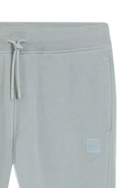 Cotton-terry tracksuit bottoms with logo patch